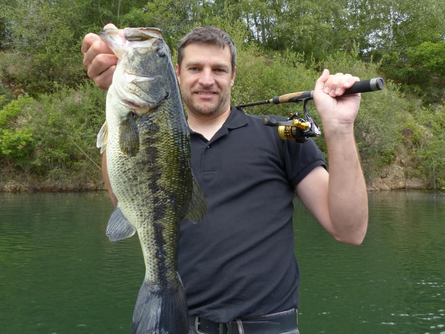 man holding bass