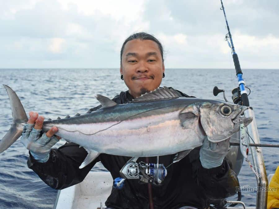 man holding a fish