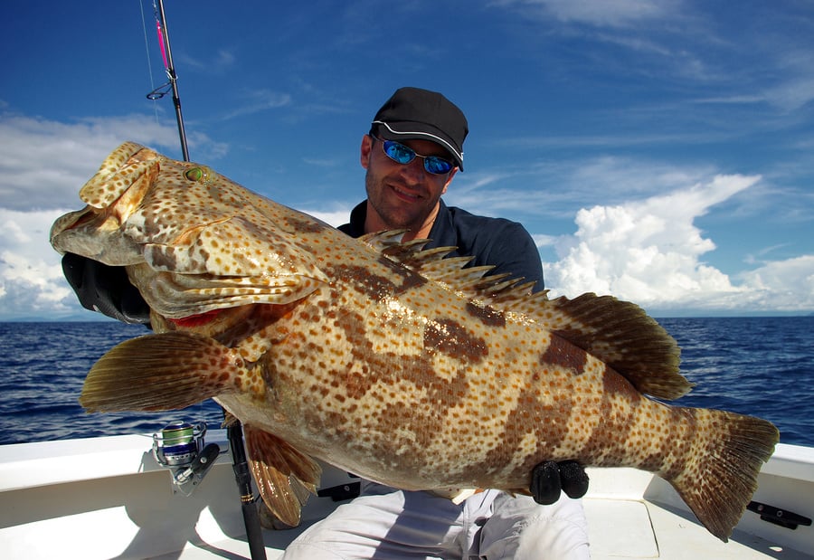 man holding a fish