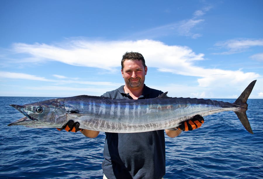 man holding a fish