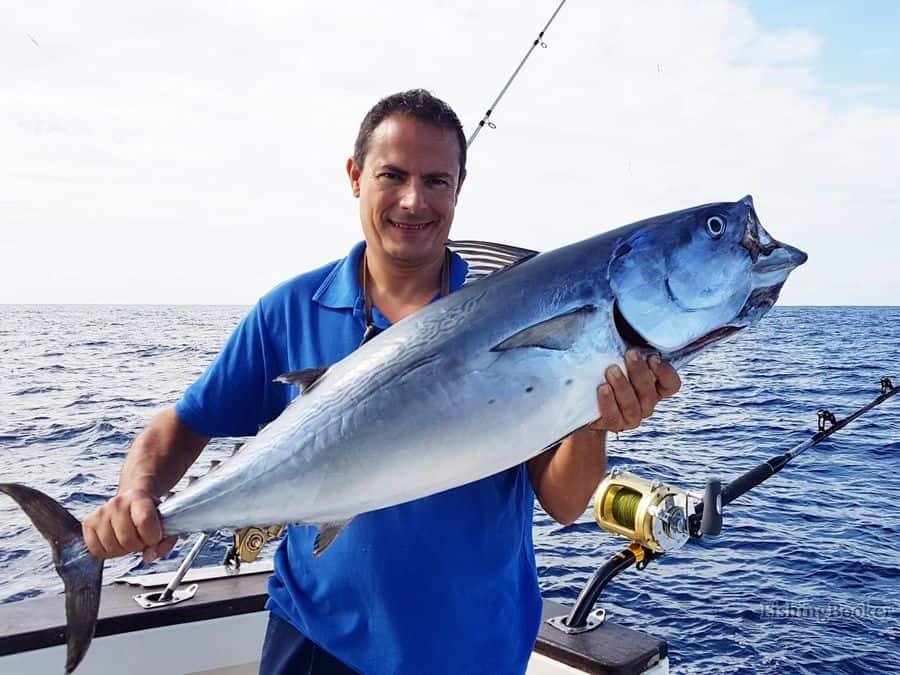 man holding a fish