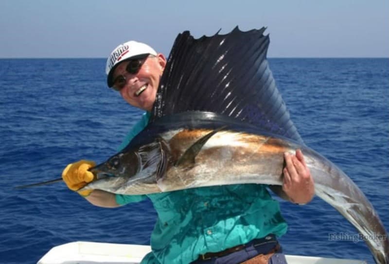 man holding a fish