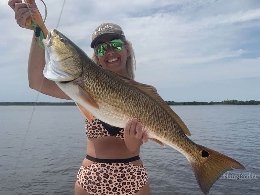 redfish caught by female angler
