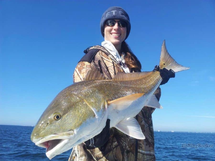 man holding a fish