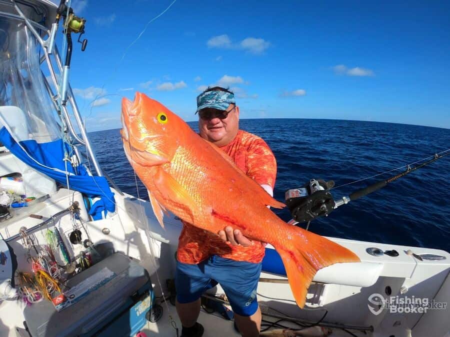 red snapper caught by happy angler